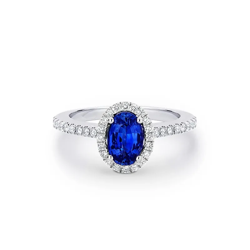 Anillo de compromiso de zafiro en oro blanco de 18K y diamantes de 0.29 cts