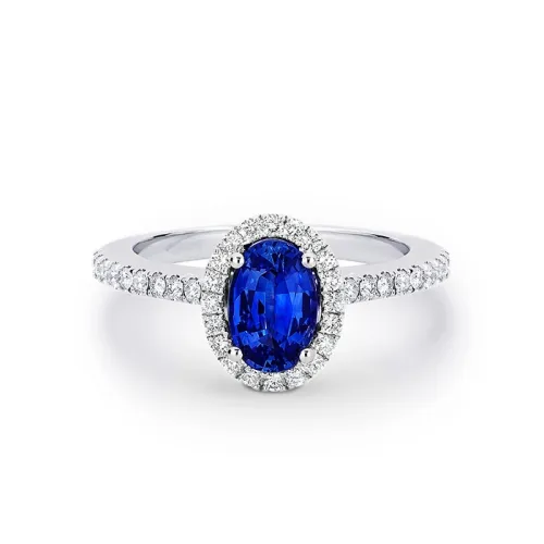 Anillo de compromiso de zafiro en oro blanco de 18K y diamantes de 0.29 cts