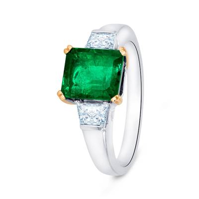 Anillo en oro con esmeralda octogonal de colombia con diamantes