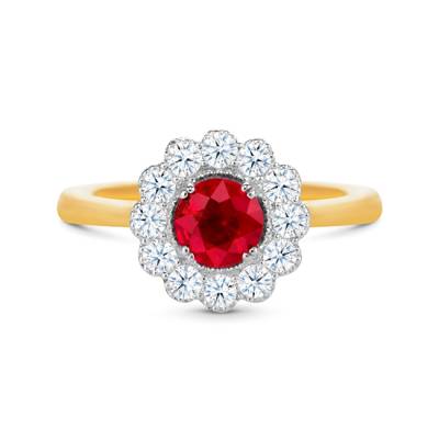 Anillo orla con un rubí redondo de 0,54 cts rodeado de brillantes que aporta luz y brillo