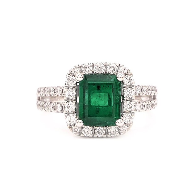 anillo en oro 18K con esmeralda de talla cuadrada y orla de diamantes brillantes