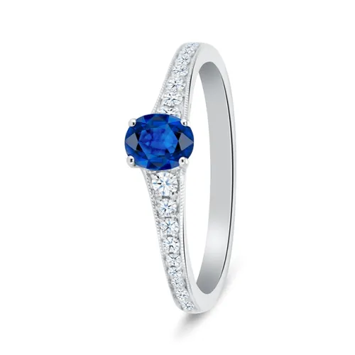 fotografia de Sortija de oro de 18K con zafiro azul natural de 0.73 quilates y diamantes en el brazo F/G VS