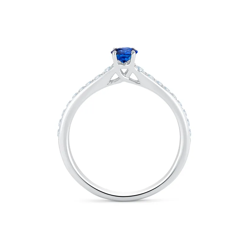 imagen de Sortija de oro de 18K con zafiro azul natural de 0.73 quilates y diamantes en el brazo F/G VS