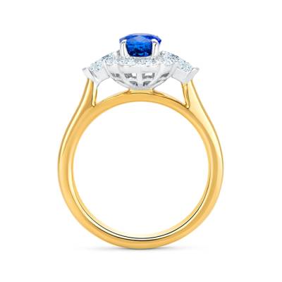 anillo en oro amarillo de ley y diamantes en orla con zafiro azul terciopelo, foto horizontal