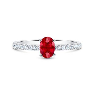 Anillo de oro 18k con rubí rojo vivido de 0.69cts acompañado de diamantes en el brazo F/E- vs-vvs