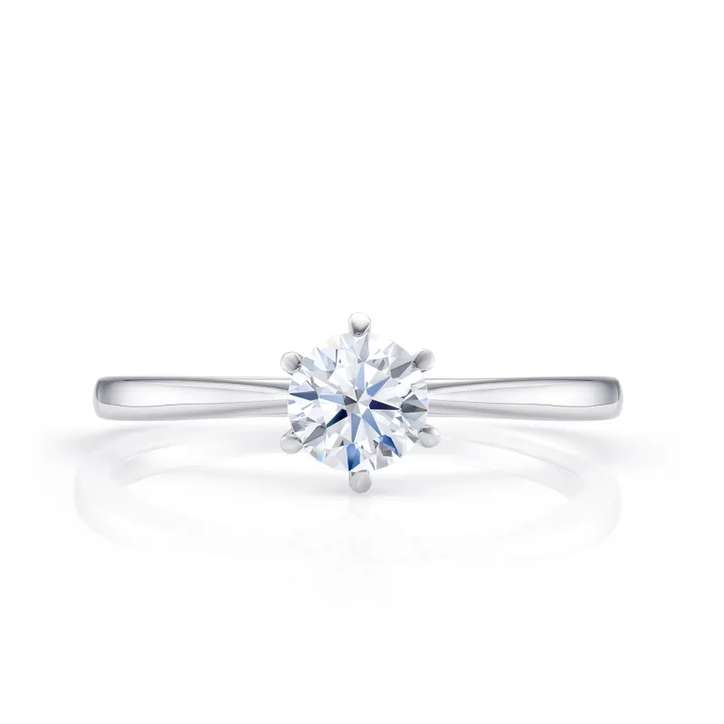 Anillo solitario clásico de compromiso en oro blanco de 18K con diamante de 0.14 cts