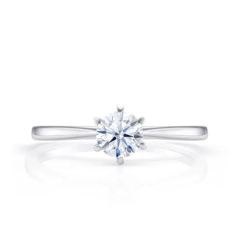 Anillo solitario clásico de compromiso en oro blanco de 18K con diamante de 0.14 cts