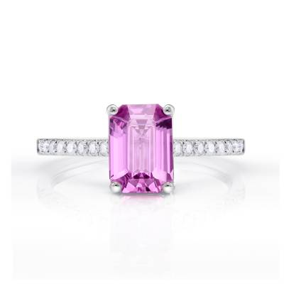 Anillo con zafiro de color pùrpura acompañado de diamantes en el brazo y realizado en oro blanco de 18k