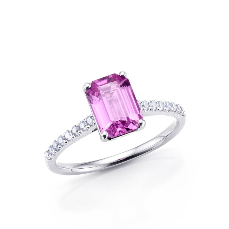 Anillo con zafiro de color pùrpura acompañado de diamantes en el brazo y realizado en oro blanco de 18k foto inclinada