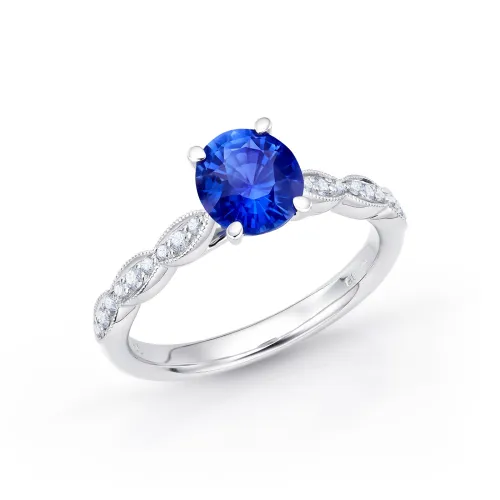 foto de Anillo de oro 18K con zafiro oval de 1.18 ct y 18 Brillantes de 0.14 ct GVS