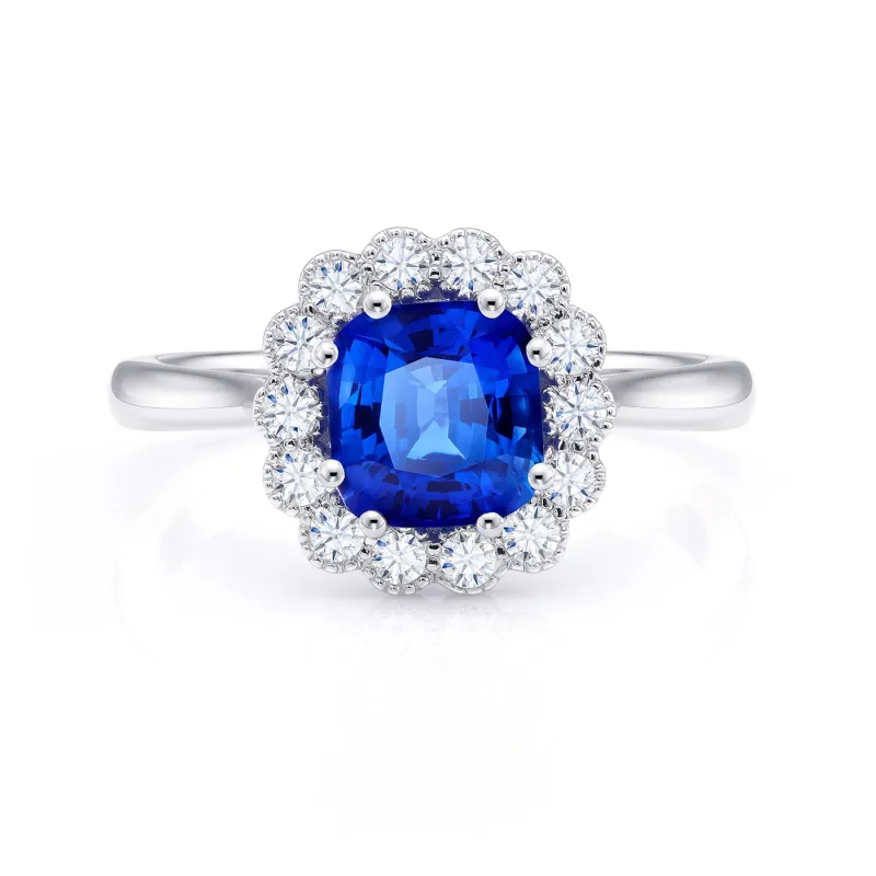 Anillo con zafiro azul en oro blanco y diamantes