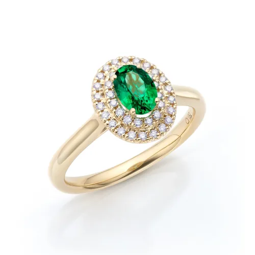 Anillo clásico con esmeralda en oro amarillo y brilantes