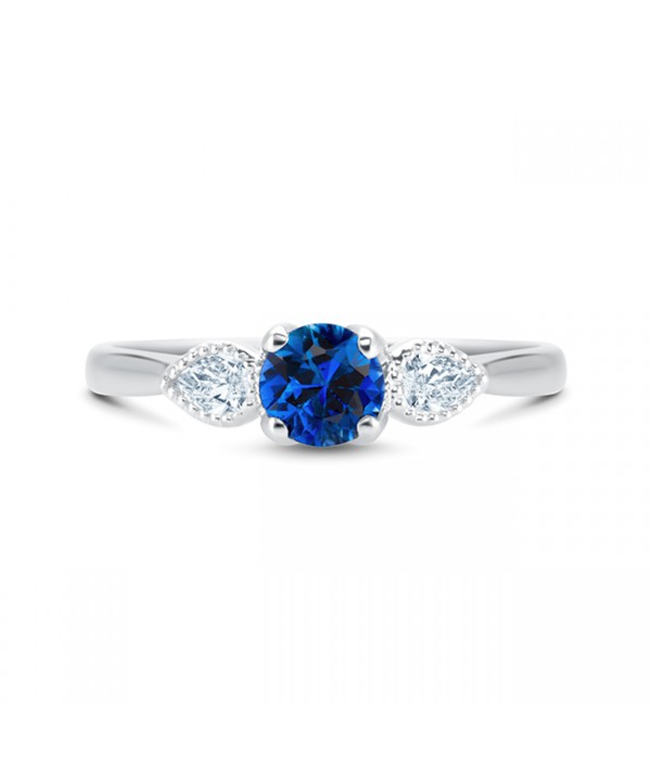 Anillo zafiro oro blanco 18k con dos diamantes talla pera  "MAGIC"