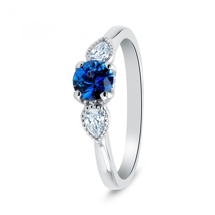 Anillo zafiro oro blanco 18k con dos diamantes talla pera  "MAGIC"