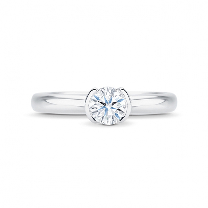 Solitario "Antique" engastado en garras y brillante 0,40 cts